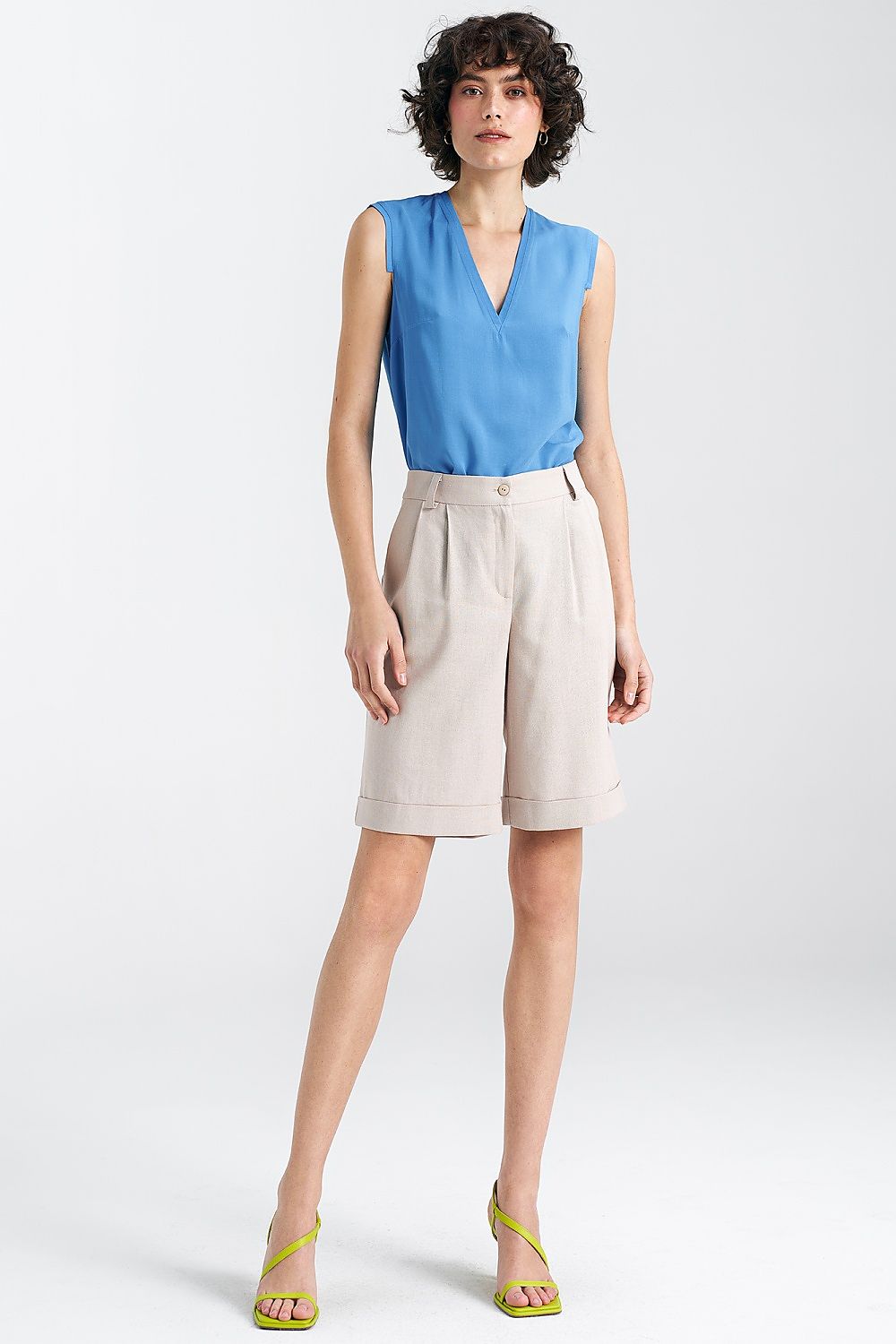 Elegant Plum Viscose Blouse With V-Neckline And Delicate Pleat Detail by Nife
