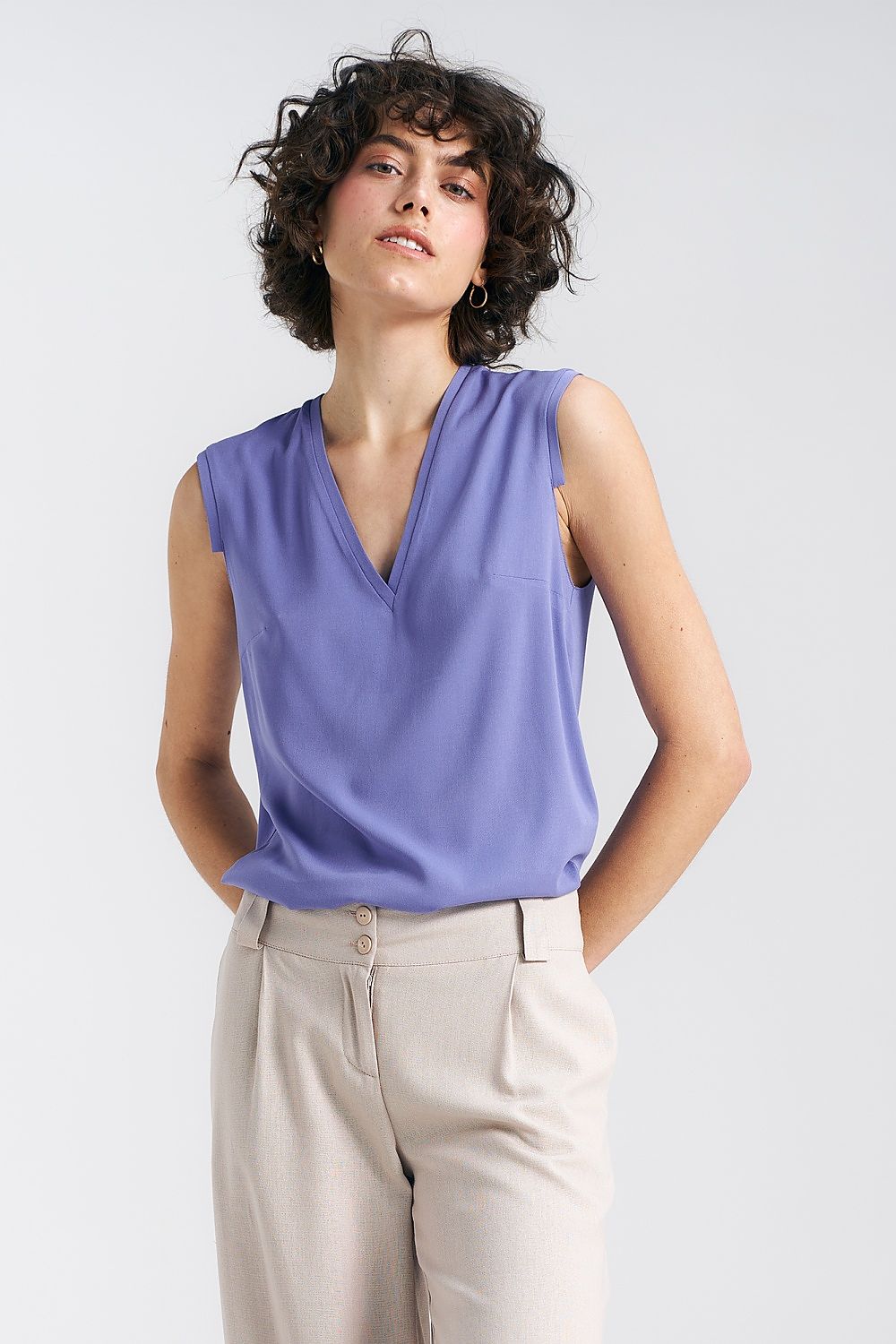 Elegant Plum Viscose Blouse With V-Neckline And Delicate Pleat Detail by Nife