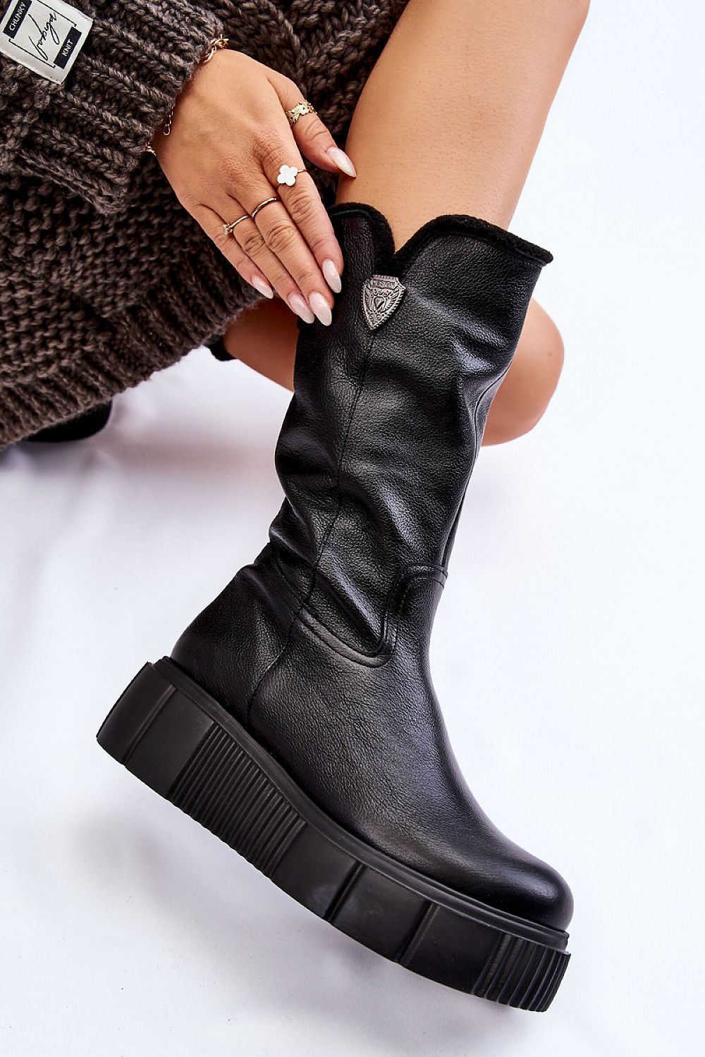 Luxury Women's Thigh-High Leather Boots with Insulated Wool Lining and Decorative Accent