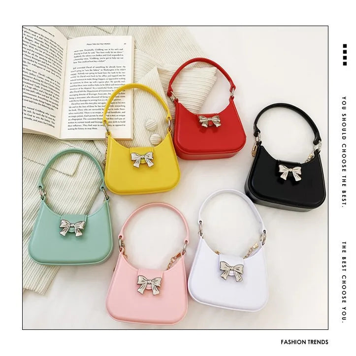 Women's PVC Solid Color Bow Knot Cute Dumpling Shape Buckle Handbag Crossbody Bag Jelly Bag