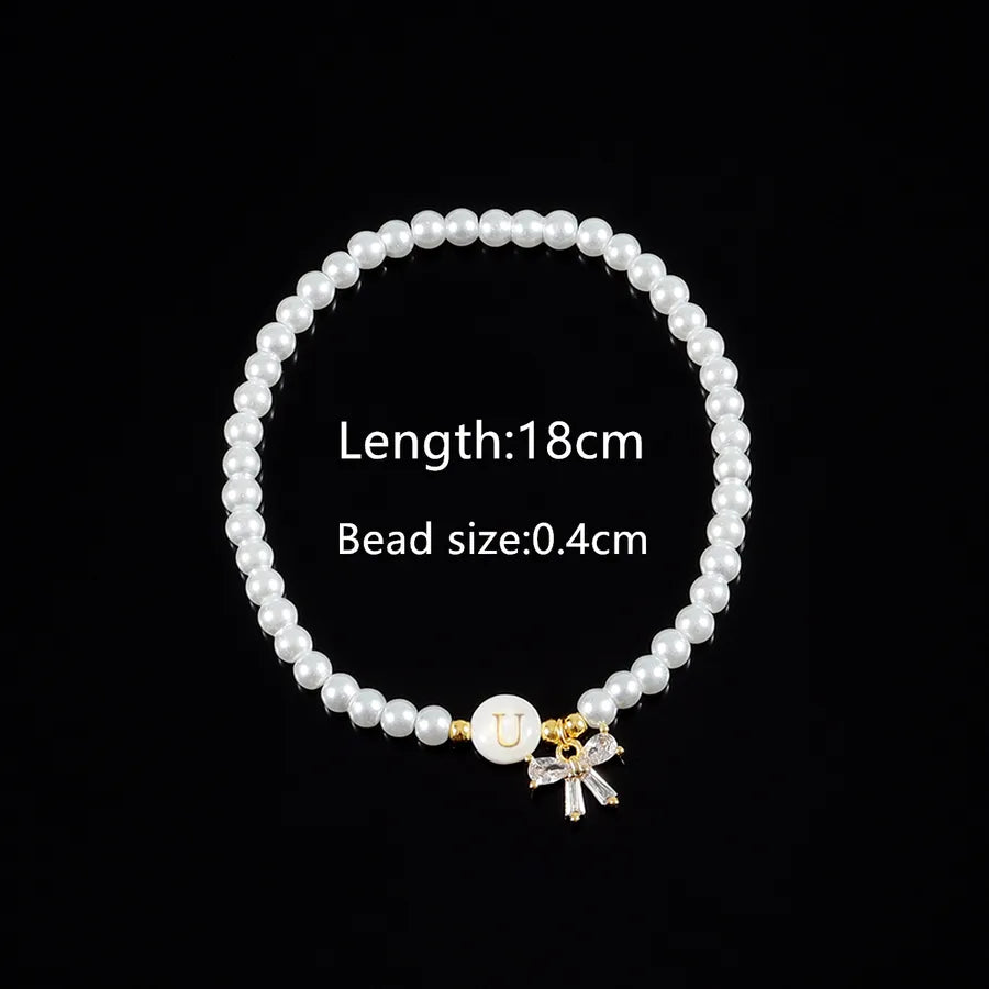 Elegant Simple Style Classic Style Letter Bow Knot Artificial Crystal Artificial Pearl Shell Beaded Chain Beaded Bracelets Wholesale