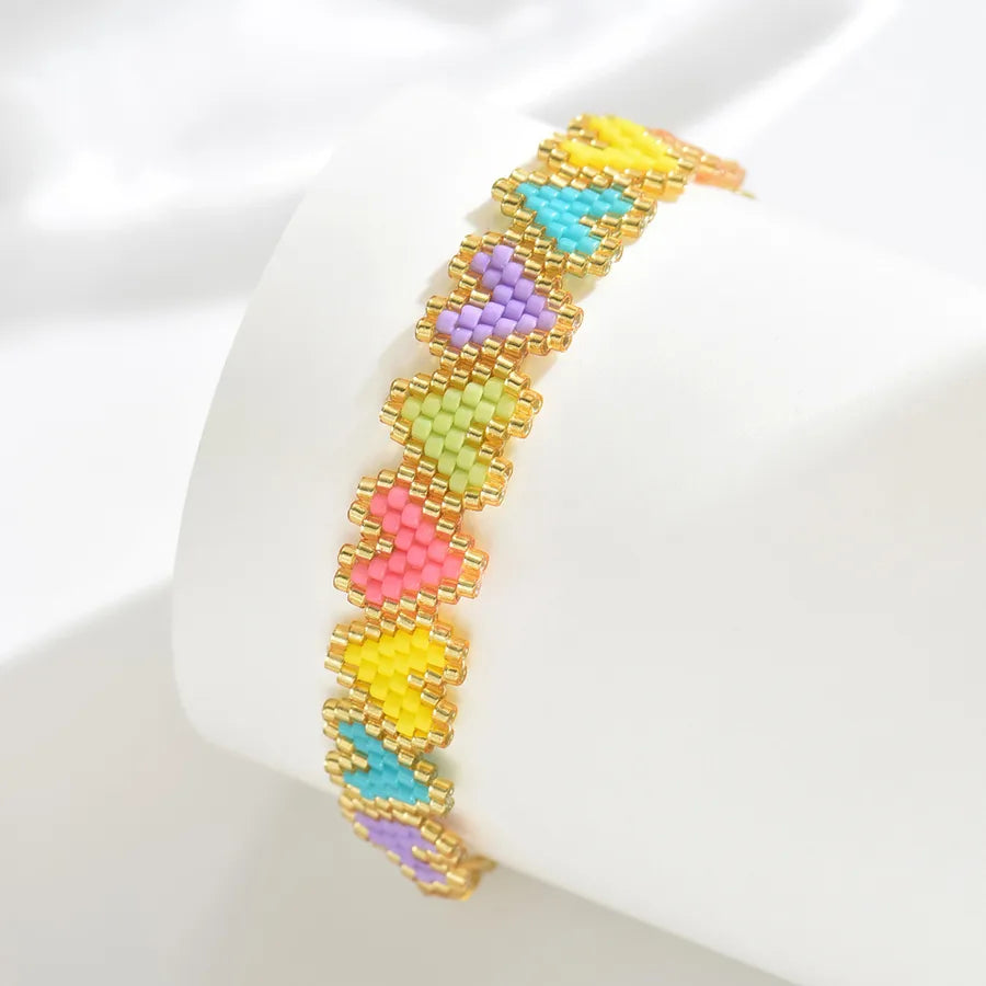Classical Ethnic Style Bohemian Round Waves Flower 304 Stainless Steel Nylon Glass Woven Chain Slider Clasp Closure Beaded Bracelets Wholesale