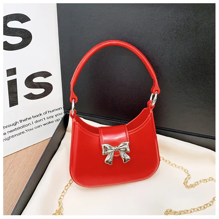 Women's PVC Solid Color Bow Knot Cute Dumpling Shape Buckle Handbag Crossbody Bag Jelly Bag