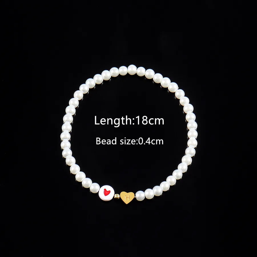 Elegant Simple Style Classic Style Letter Heart Shape 304 Stainless Steel Artificial Pearl Plastic Wholesale Bracelets