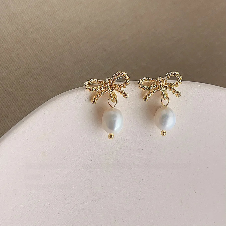 Collection! Freshwater Pearl hand-made design sense temperament simple light luxury earrings factory earrings Yiwu earrings wholesale