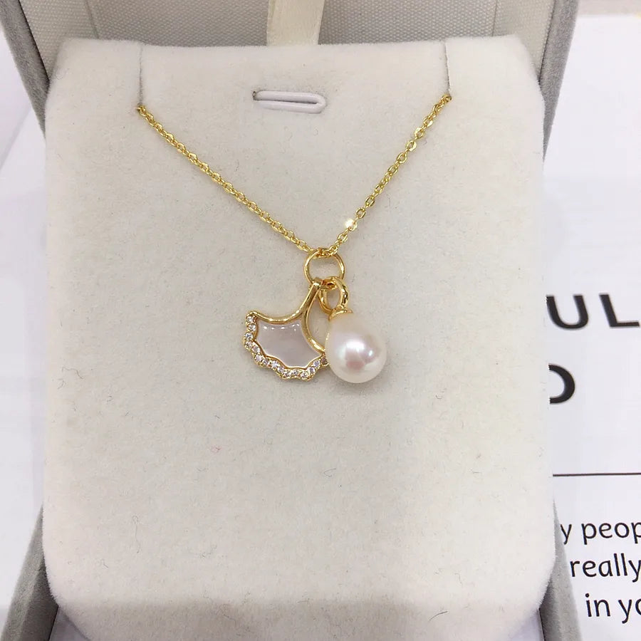 Zhuji origin natural freshwater pearl pendant ginkgo leaf natural sea shell mother pearl pendant jewelry wholesale