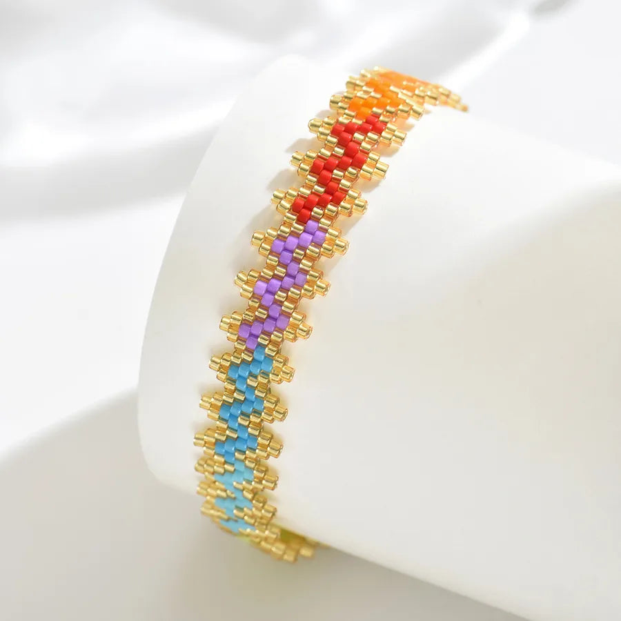 Classical Ethnic Style Bohemian Round Waves Flower 304 Stainless Steel Nylon Glass Woven Chain Slider Clasp Closure Beaded Bracelets Wholesale