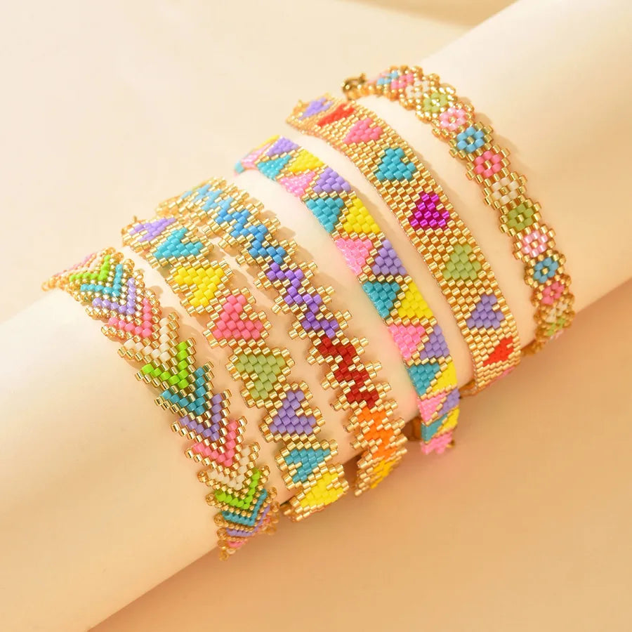 Classical Ethnic Style Bohemian Round Waves Flower 304 Stainless Steel Nylon Glass Woven Chain Slider Clasp Closure Beaded Bracelets Wholesale