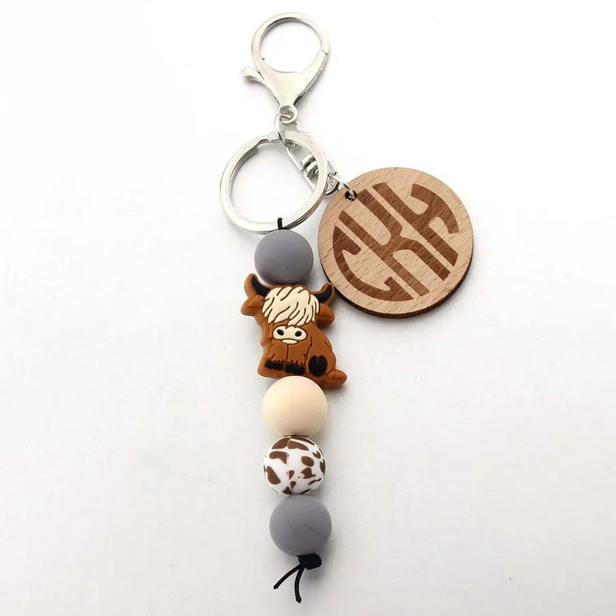 Cute Letter Cattle Flower Silica Gel Unisex Keychain