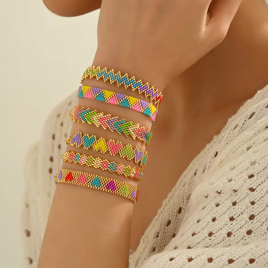 Classical Ethnic Style Bohemian Round Waves Flower 304 Stainless Steel Nylon Glass Woven Chain Slider Clasp Closure Beaded Bracelets Wholesale