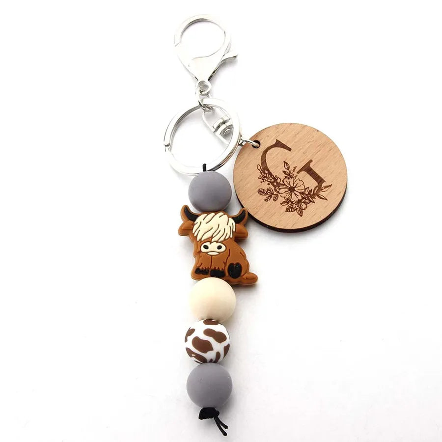 Cute Letter Cattle Flower Silica Gel Unisex Keychain