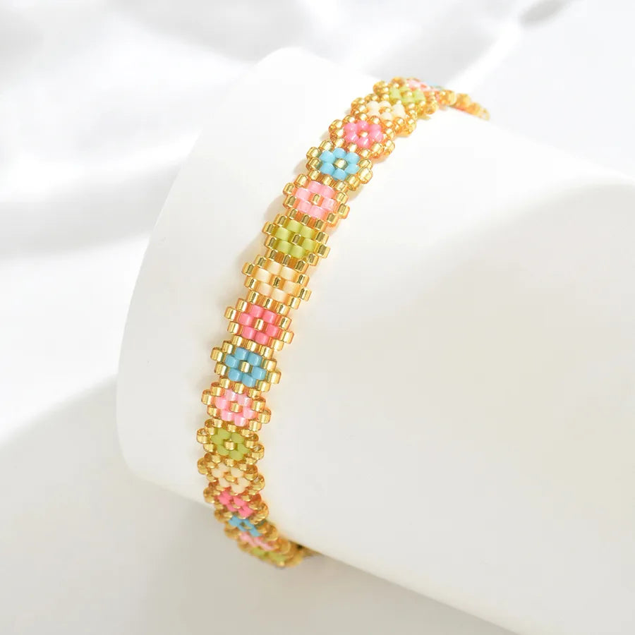 Classical Ethnic Style Bohemian Round Waves Flower 304 Stainless Steel Nylon Glass Woven Chain Slider Clasp Closure Beaded Bracelets Wholesale