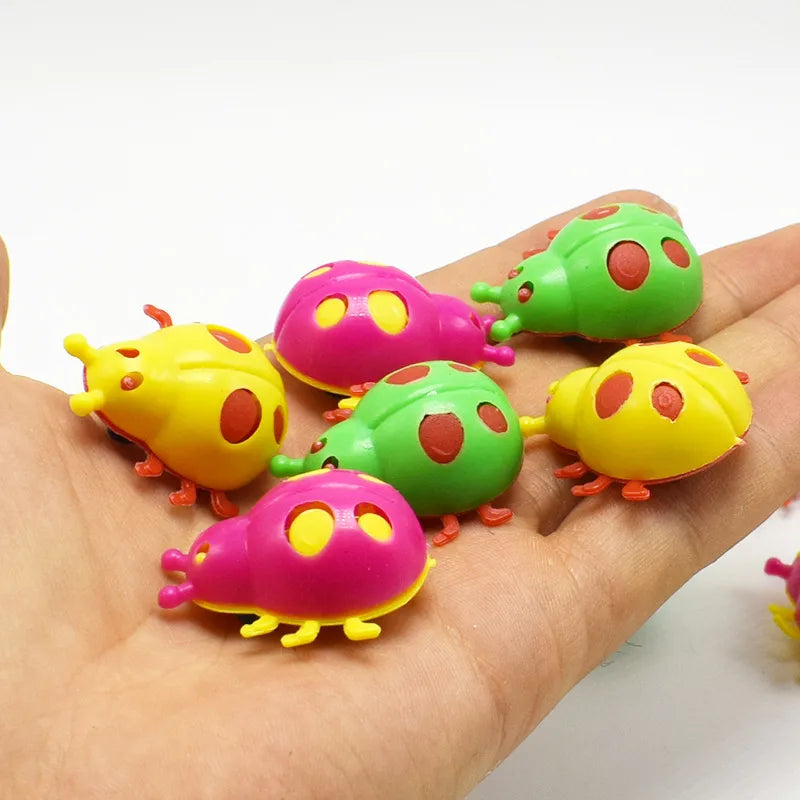 ladybird shaped colorful capsule toy with wheels