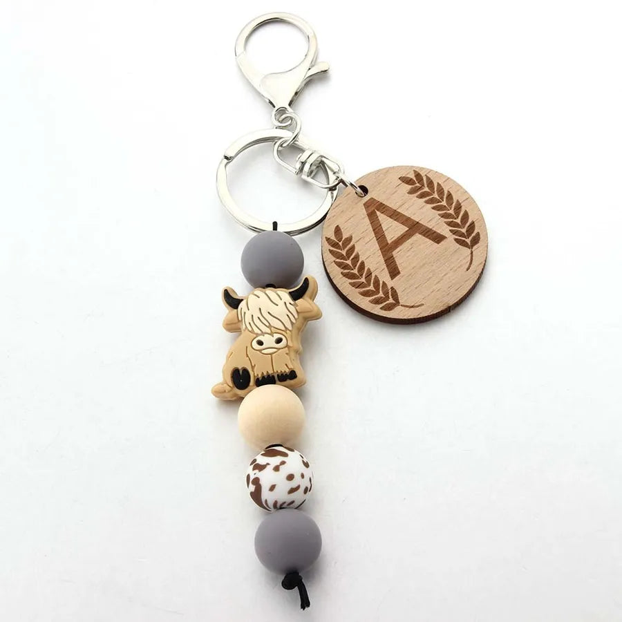 Cute Letter Cattle Flower Silica Gel Unisex Keychain